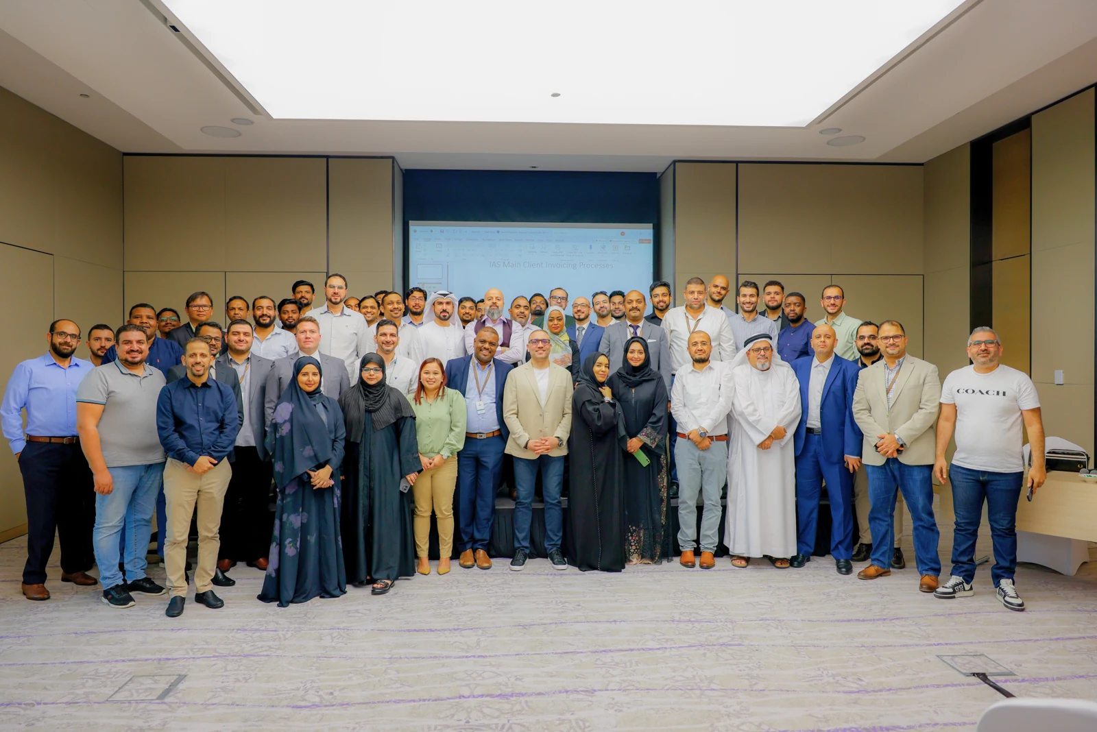 Ryad Al Mashhour with participants in a training programme